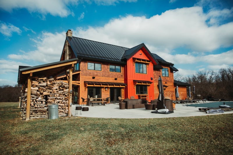 exterior view of country home with wood siding; by SIP panel supplier PanelWrights - photo